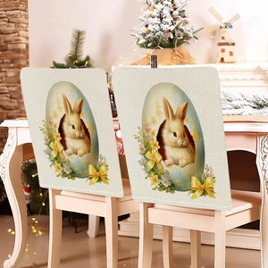 Close-up of Easter chair cover featuring a rabbit in a blue egg on linen fabric