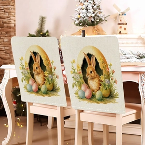 Detailed close-up of Easter chair covers featuring bunny and egg patterns on a dining chair
