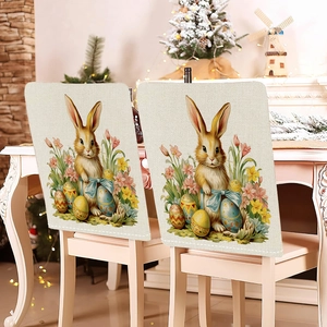 Detail of linen chair covers featuring Easter bunny and floral print on rustic chairs
