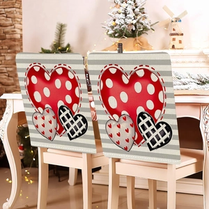 Close-up of striped Valentine chair covers with heart patterns in a festive home setting