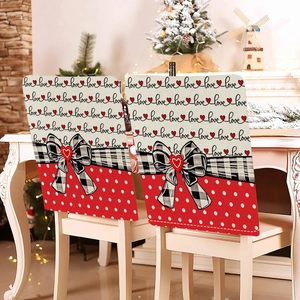 Close-up of striped Valentine chair cover featuring love hearts and a buffalo plaid bow
