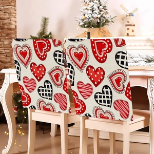 Detail of Valentines striped heart chair cover on a white chair with warm holiday decor