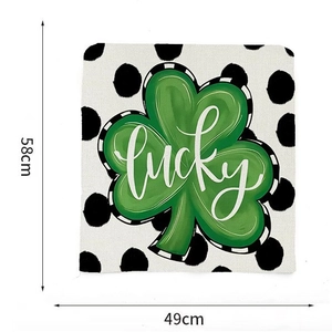Saint Patrick's Day chair cover with green lucky clover design, 58x49cm size detail