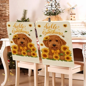 Detail van Hello Sunshine linnen stoelhoezen met golden retriever en zonnebloempatroon