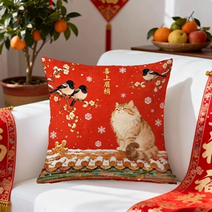 Festive red Chinese New Year cushion cover featuring a cat and magpie on a white sofa