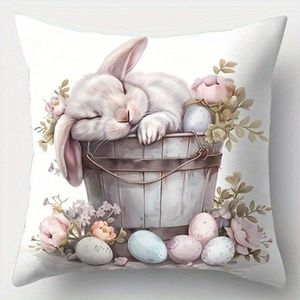Easter pillow cover featuring a cute bunny in a basket with eggs and pink flowers