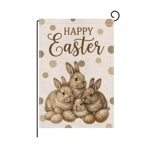 Close-up of Happy Easter garden flag featuring cute rabbits, eggs and burlap texture