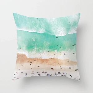 Modern square pillow case featuring colorful beach aerial photography on soft peach skin fabric