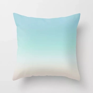 Detail of soft peach skin pillowcase featuring a blue and beige gradient design