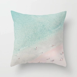 Detail showing high-quality peach skin fabric and minimalist beach photography print cushion