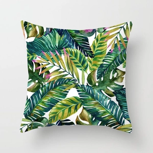 Macro detail of tropical leaf print on soft peach skin fabric square pillowcase cover