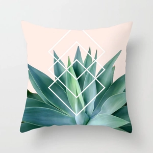 Tropical leaf print pillowcase with pink background and geometric diamond pattern accents