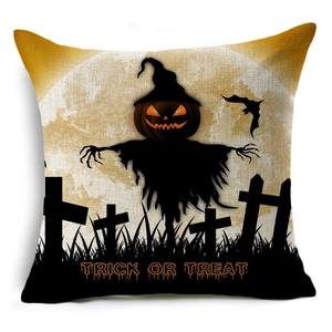 Detail of Halloween linen pillowcase featuring trick or treat scarecrow print