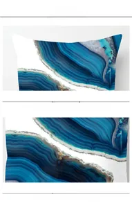 Detail of high-density stitching and blue marble texture on peach skin cushion cover