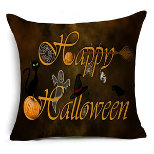 Detail of linen Halloween pillowcase with Happy Halloween text and festive pumpkin icons