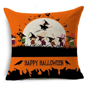 Detail of Halloween throw pillow cover showing witch and bat patterns with texture