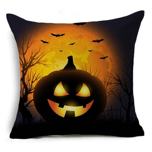 Macro shot of Halloween pumpkin and bat pattern on textured linen throw pillow cover