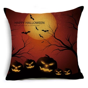 Detail of Happy Halloween pillow case with moon, bats and pumpkins on linen fabric