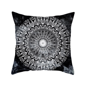 Modern bohemian black mandala throw pillow cover with intricate white geometric pattern