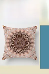 Close-up of bohemian mandala pattern with intricate geometric prints on orange pillow case