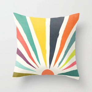 Detailed view of square cushion cover with modern abstract sunrise pattern on fabric