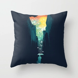 Detailed close-up of navy blue pillowcase featuring artistic city sunset illustration