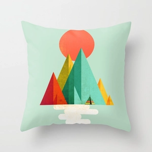 Detail of square cushion cover with modern geometric sunrise and mountain pattern