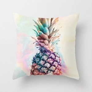 Detailed close-up of linen pillowcase with colorful watercolor pineapple art print