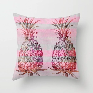 Detail of artistic pineapple print on linen pillowcase with pink and grey stripes