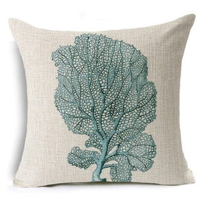 Macro detail of teal coral pattern on high-quality woven linen fabric pillow cover