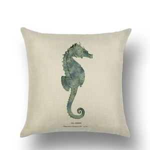 Detail of vintage hand-painted seahorse linen pillow cover with retro sea life print