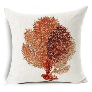 Detailed macro view of textured linen fabric with coral print on the throw pillow cover