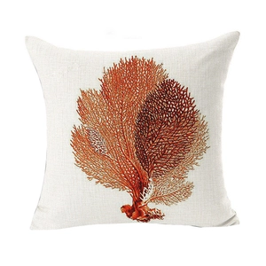 Linen ocean pillowcase featuring a detailed hand-painted orange coral pattern on white