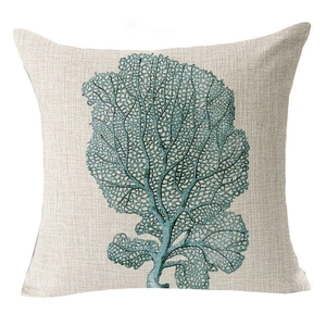 Linen pillow cover featuring teal coral sea life print on a beige textured background