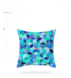 Detail of geometric cube pattern with gold lines on blue marble pillowcase cover