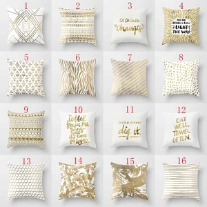 Set of 16 white square pillowcases with gold geometric and motivational pattern prints