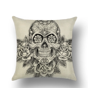 Detail of linen Halloween pillow cover with skull and rose sketch design