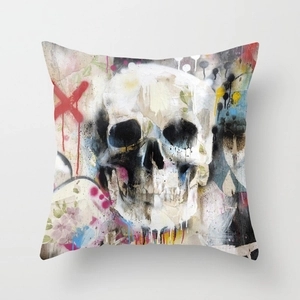 Detail of linen Halloween skull pillowcase with colorful graffiti art and spray paint pattern