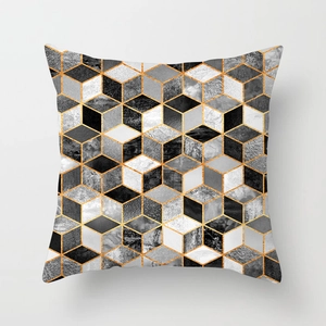 Modern geometric pillow cover with 3D gold cube pattern on soft peach skin fabric
