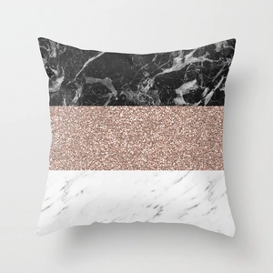 Detail of three-tier geometric cushion cover with marble patterns and rose gold glitter