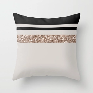 Detailed close-up of modern geometric pillowcase with peach skin fabric and gold glitter band