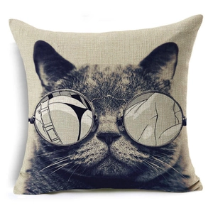 Detailed macro view of the coarse linen texture and cat with glasses print on cushion cover