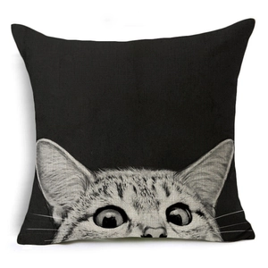 Detailed view of the linen texture and cat portrait print on black cushion cover