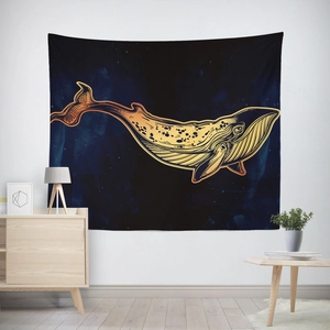 Artistic golden whale tapestry with deep blue space nebula background in modern home setting