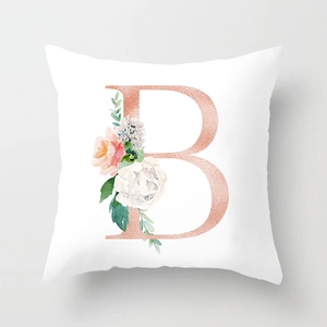 Modern floral cushion cover featuring a rose gold letter B and white peony design