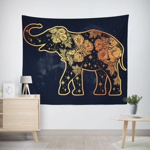 Artistic golden elephant tapestry on deep blue fabric hung in a modern minimalist bedroom