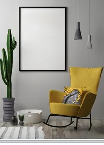 Detail of grey textured cushion cover with yellow tree pattern on a modern yellow chair