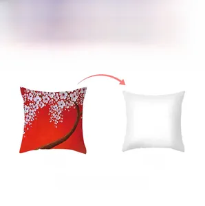 Detail view of the red floral oil painting print and white back of this pillowcase