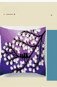 Detailed macro view of digital print pillowcase featuring artistic purple tree and floral patterns