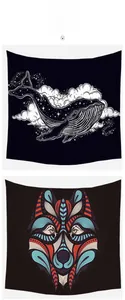 Detailed view of tapestry fabric with abstract whale and tribal wolf head patterns